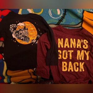 two, 3T long sleeve shirts.